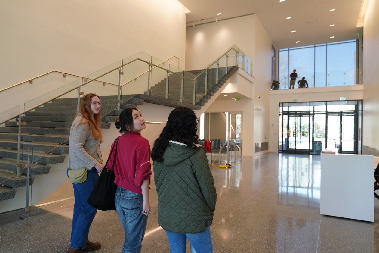 Museum interns enjoy the airy atrium at the renovated Muscarelle Museum of Art