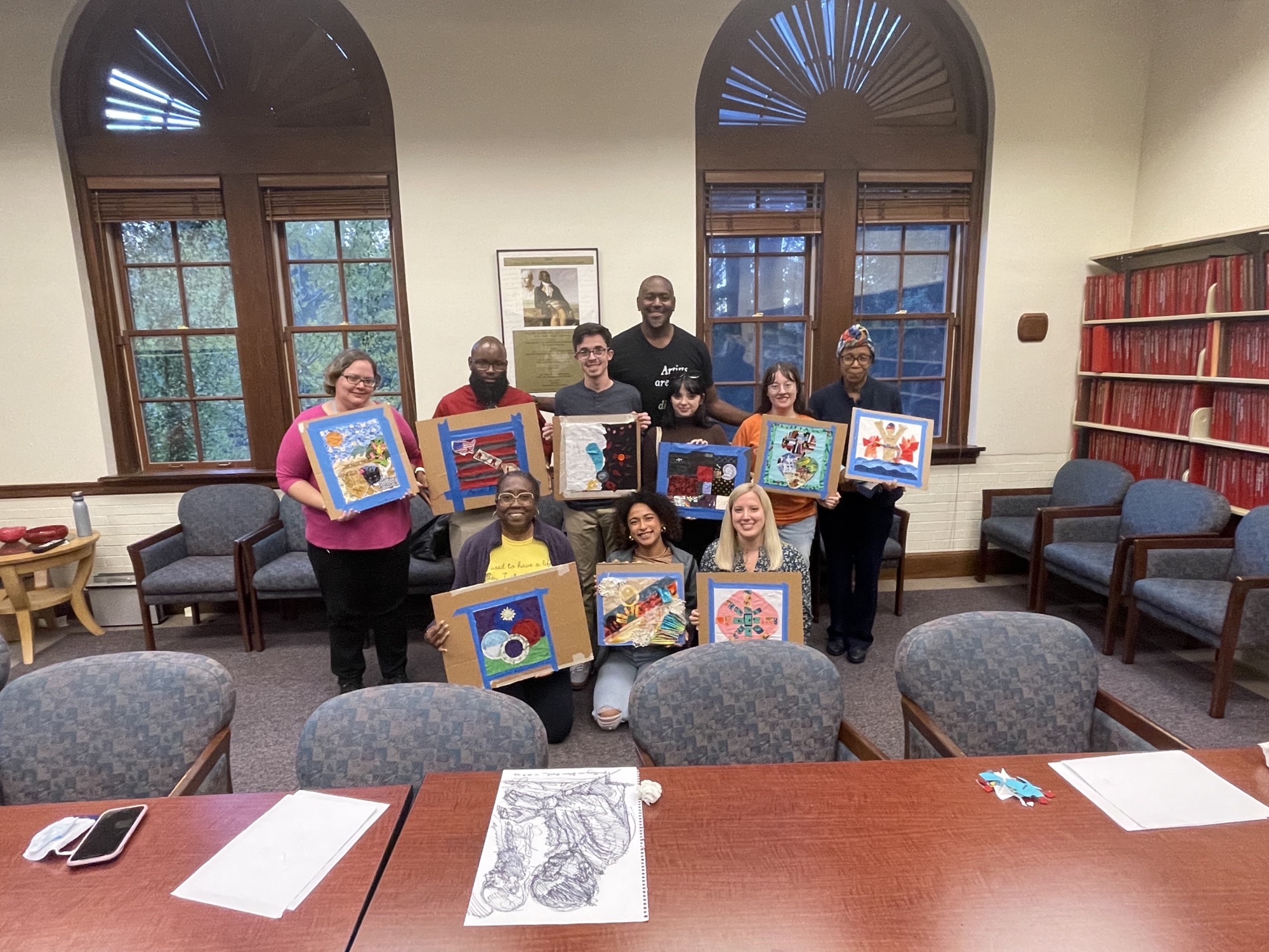 Steve Prince with Clemson visitors displaying their quit projects. 