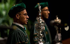 Student leaders holding the Mace at Charter Day