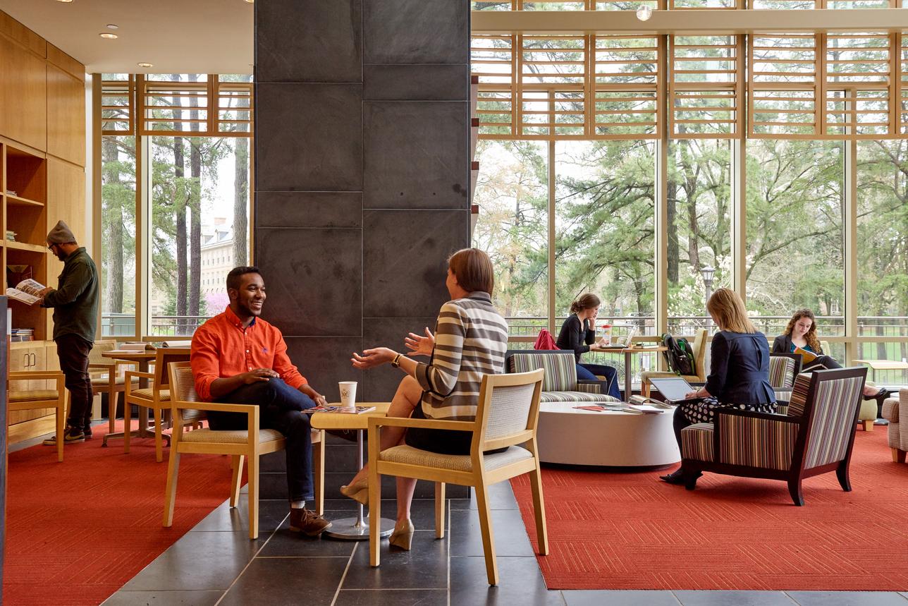 Students and staff meeting in the Career Center lobby