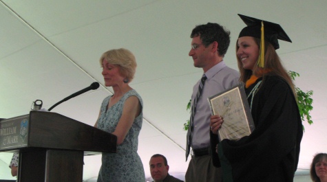 Christina Moore accepts the Charlotte Mangum award