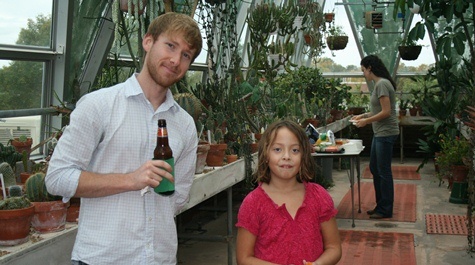 Current graduate student Mark Guillotte after helping set up, with Dr. Kerscher's daughter Stella.
