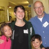 Dr. Kerscher greets alumna and kids