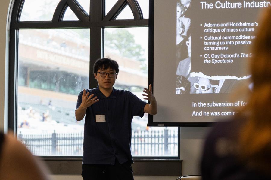 Senior Eric Huang, a philosophy major and mathematics minor, discusses his thesis research, "The aesthetics of liberation: The status of art within capitalism," April 4 in Sadler Center. (Photo by Tess Willett)