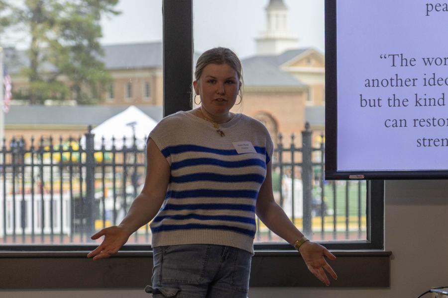 Anne Ryan Gareis, a religious studies and English double major, discusses "Ingredients for Enlightenment: Food and the path of liberation" April 4 in Sadler Center. (Photo by Tess Willett)