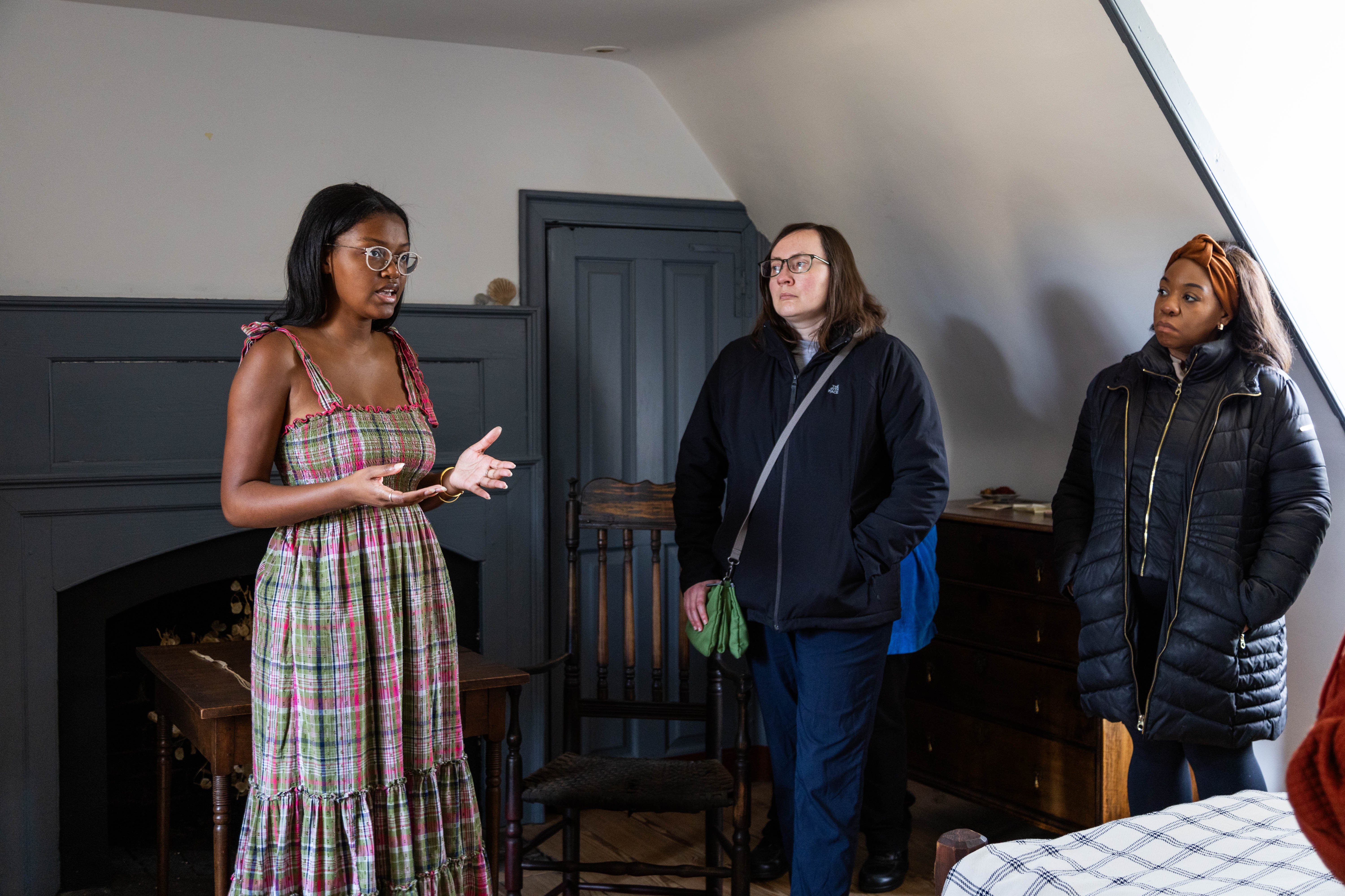 During a tour last December, Page (left) responds to guests' questions about the life histories of African American residents of Smith's Fort. (Photo by Tess Willett)