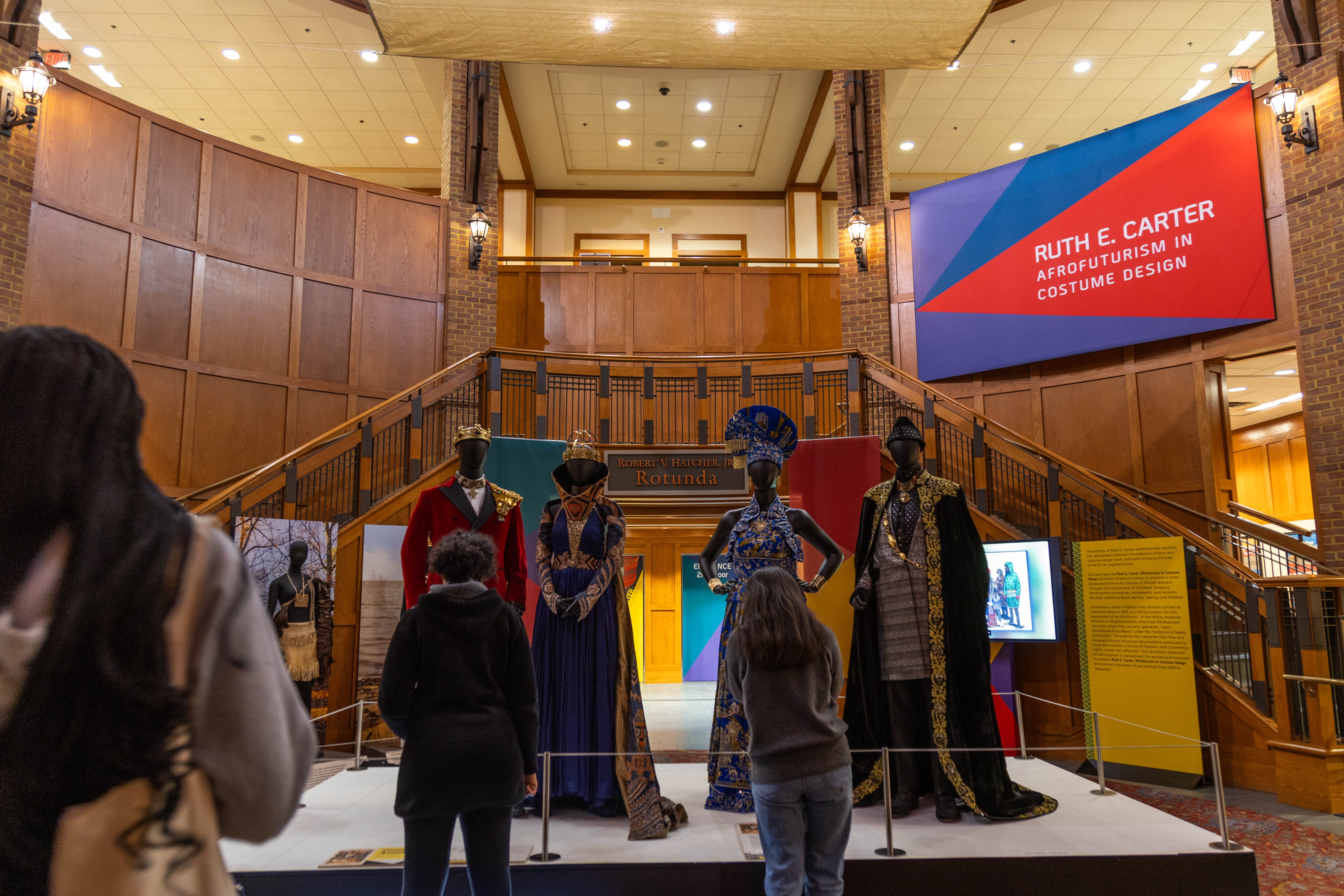 Students in the W&M Scholars Undergraduate Research Experience (WMSURE) toured the Ruth E. Carter Afrofuturism exhibit at James Settlement museum Nov. 13. (Photo by Tess Willett)