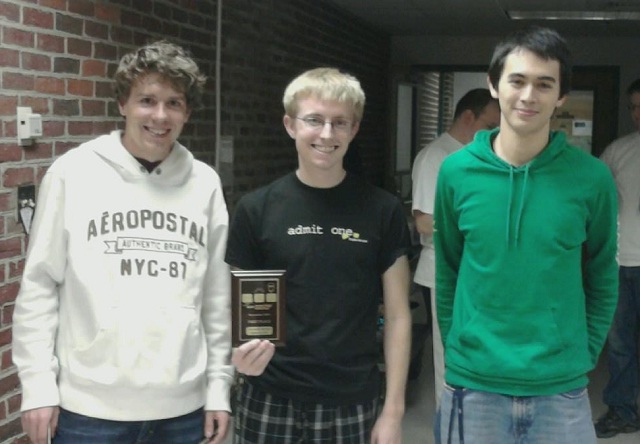 Team 1 (William & 玛丽 Gold) holding their first-on-site plaque.  From left to right, Aaron Dufour (2012), Brett Cooley (2013), and Michael Christensen (2011).