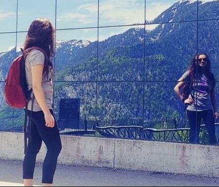 Gabriella Carney ('18) with a mountain in the distance.