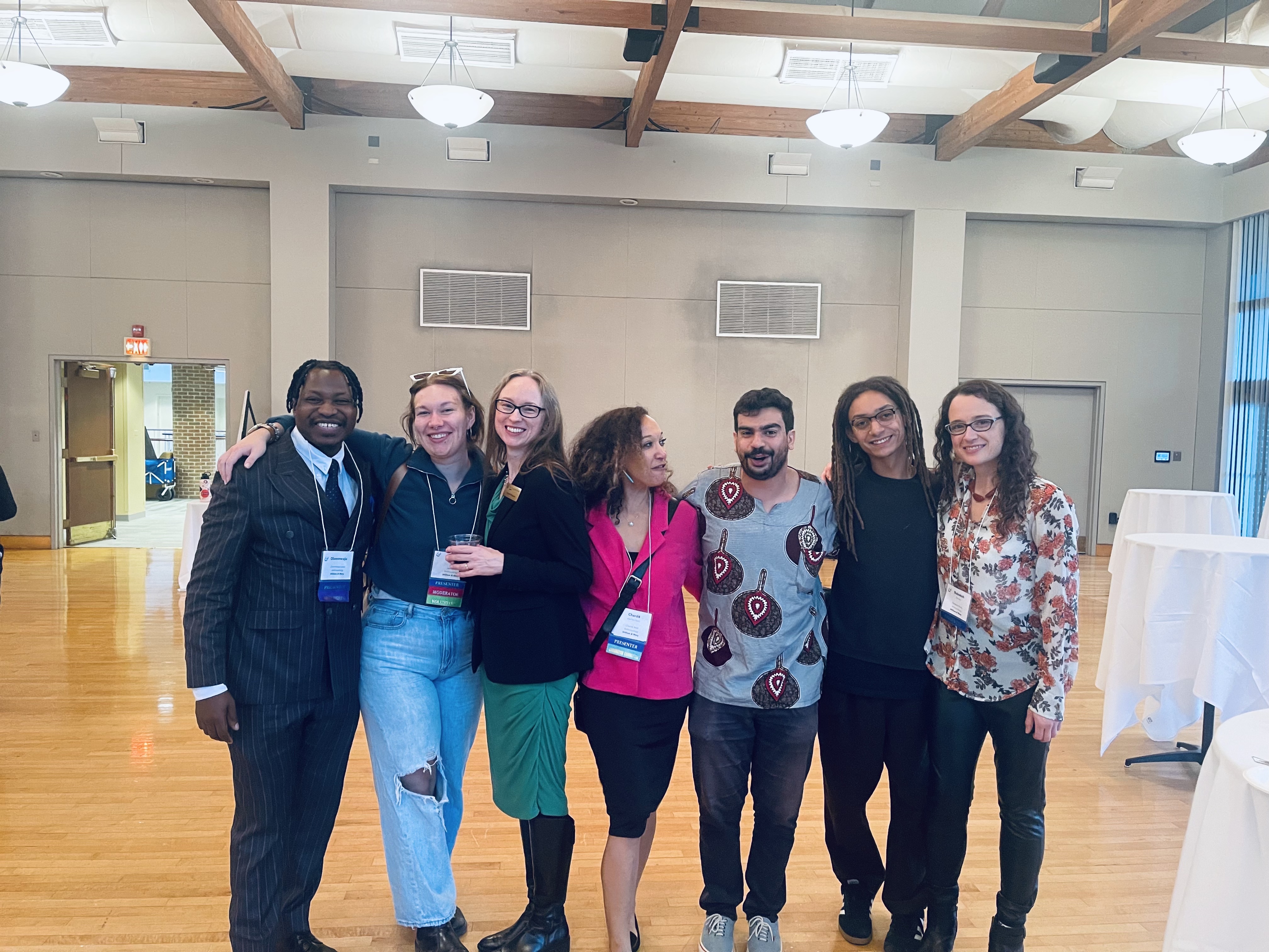 A&S Graduate Center Director Sarah Glosson (third from left) with anthropology doctoral students (left to right) Olanrewaju Blessing Lasisi M.A. ’18, Ph.D. ’23, Jennifer Ellis M.A. ’18, Chardé Reid M.A. ’19, Diogo Oliveira, Malachi Tripaldi M.A. ’22 and Rebekah Planto at the concluding reception of the 2023 Symposium (Photo provided by Sarah Glosson)