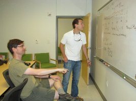 Patrick King with Professor Erlich discussing about their research