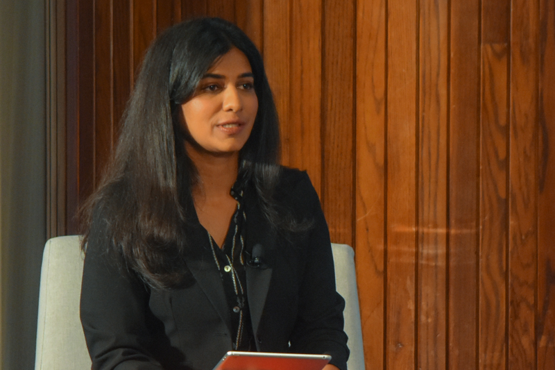 Divya Mathew (MPP ’19) moderates a panel. Photo courtesy of Alan Kotok, National Press Club.