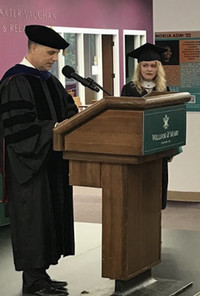 Prof. Manna awards Katherine Kivimaki ('24) the Megan Owen Award