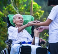 Senior in wheel chair cropped