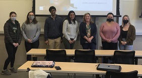 Courtney Hesselbacher with students at talk
