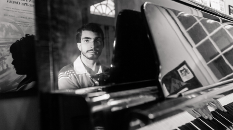 At the piano