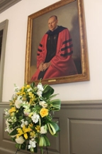 Memorial wreath at Graves' portrait in the Wren Building. Photo by Justin Thomas