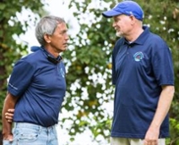 VIMS professor Kirk Havens (right) speaks with long-time friend and Pwo Navigator Nainoa Thompson. Thompson is President of the Polynesian Voyaging Society. (Photo by J. Michael Foreman)