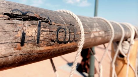 Engraved boom: