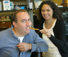 Jon Allen and Aurora Esquela-Kerscher reenact the removal of Buddy, using a gummy worm. (Photo by Joseph McClain)