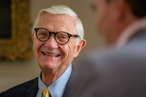 Taylor Reveley III shares a laugh with his son. (Photo by Skip Rowland '83)