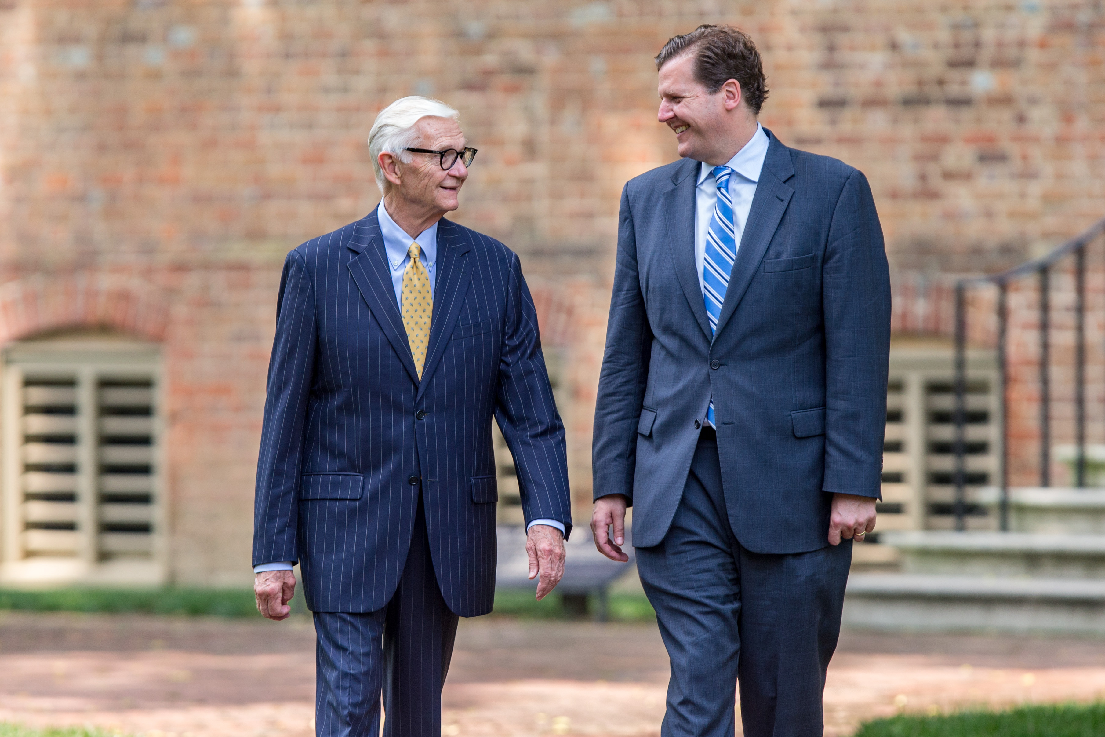 The two Taylors walk across campus together. (Photo by Skip Rowland '83)