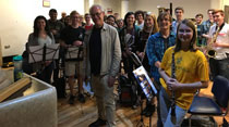 Wind Ensemble members at their workshop with British composer Adam Gorb, center. (Photo by Richard Marcus)