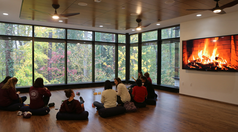 Students in the knitting group work on their projects. (Photo by Stephen Salpukas)