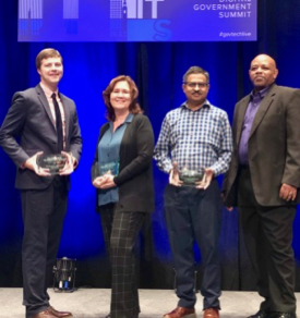 The StormSense Core Team following their acceptance of the Governor's Technology Award. From left: Derek Loftis (VIMS), Tammie Organski (Newport News, GIS Manager), Sridhar Katragadda (Virginia Beach, Lead Data Scientist) and Pedro Wallace (Virginia Beach, CIO). (Photo by K. Havens/VIMS)