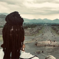Omiyẹmi Artisia Green at the top of the Pyramid of the Moon in San Juan Teotihuacán, Mexico. (Photo by Erwin Thomas)