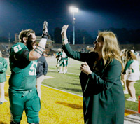 Huge high-fives a W&M football player
