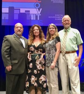 Four members of the WetCAT team accepted the Governor’s Award in the category “IT as Efficiency Driver - Government to Citizen.” From left: Dave Davis, director of the Office of Wetlands & Stream Protection at the Virginia Department of Environmental Quality; Michelle Henicheck, Senior DEQ Wetlands Ecologist; Tami Rudickny, senior GIS programmer with CCRM at VIMS; and Kirk Havens, CCRM Assistant Director. (Photo by D. Loftis/VIMS)