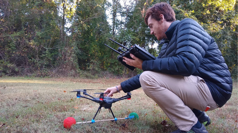 Timothy Boycott collects data using a drone