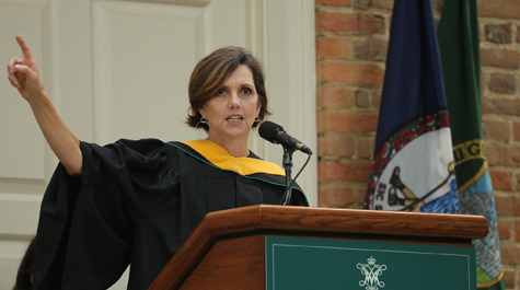 Beth Comstock at a podium