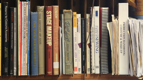 Bookshelf full of books on various aspects of costuming