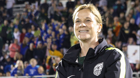 Jill Ellis in a soccer stadium