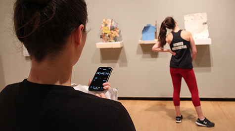 Saylor Zechman  tracks study participant Caitlen Macias Hentze as she views abstract art in the Muscarelle