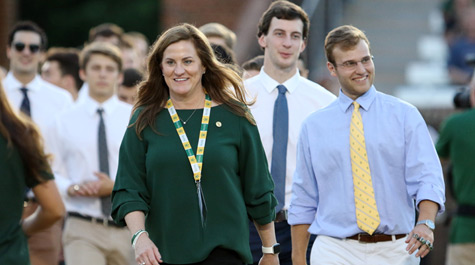 Huge leads CAA champion men's swim team for on-field recognition