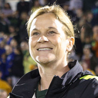 Jill Ellis in a soccer stadium