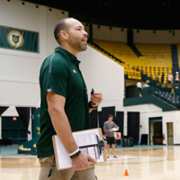 Erik Korem on the basketball court during practice