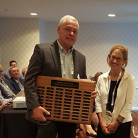 C. Lawrence Evans wins award