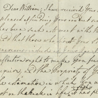 An old, yellowed piece of paper with writing in cursive