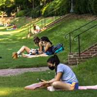 Students wearing masks at Sunken Garden