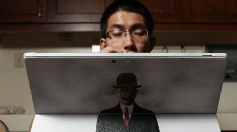 Student looking at laptop screen