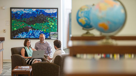 Mark Hofer and two colleagues sitting and talking