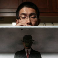 Student looking at laptop screen