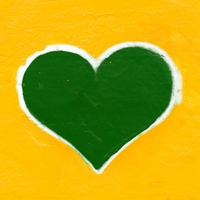 A great heart outlined in white on a yellow background