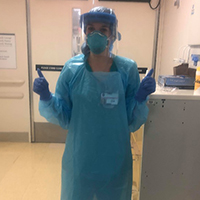 Photo of Stephanie Bevan wearing personal protective equipment or PPE