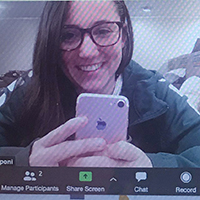  student teacher in the elementary education program, connects with one of her mentees over Zoom. 