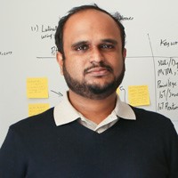 Adwait Nadkarni in front of whiteboard